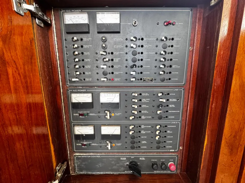 Slide: The Image of Electrical control panel on a 1991 Tiara Yachts 3600 Convertible boat. - 46
