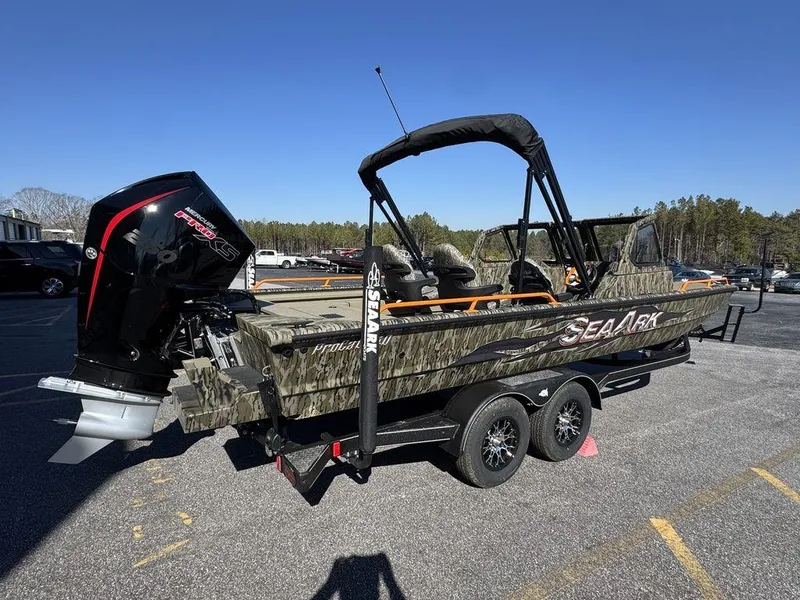 Slide: The Image of 2025 SeaArk ProCat 240 boat with camouflage design and powerful outboard motor. - 4