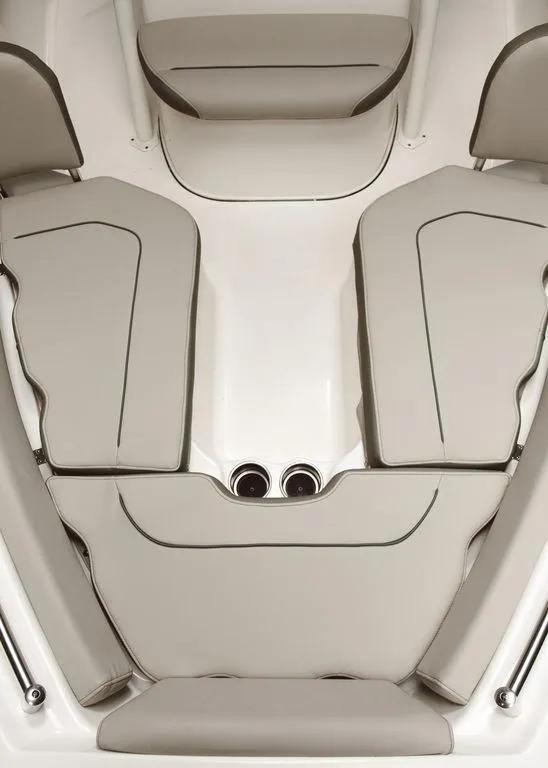 Slide: The Image of 2025 Key West 219fs boat interior with cushioned seating and sleek design. - 22