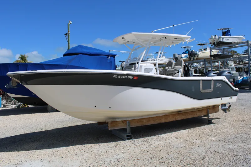 The Image of 2021 Sea Fox 268 Commander boat on display in a marina setting. - 1