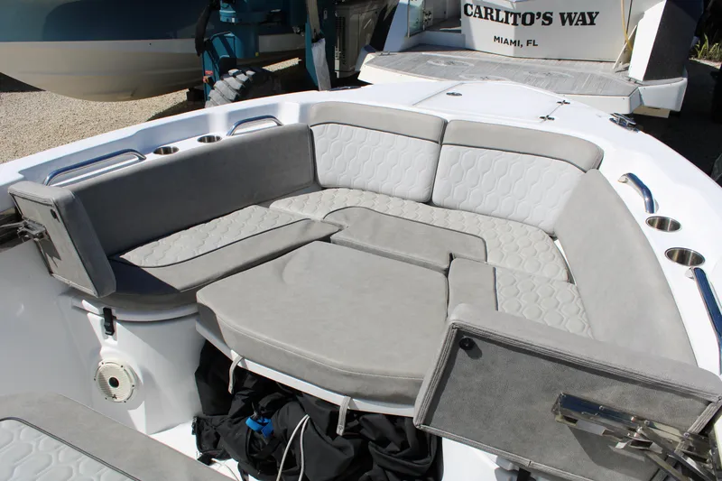 Slide: The Image of 2021 Sea Fox 268 Commander boat with spacious gray seating area. - 23
