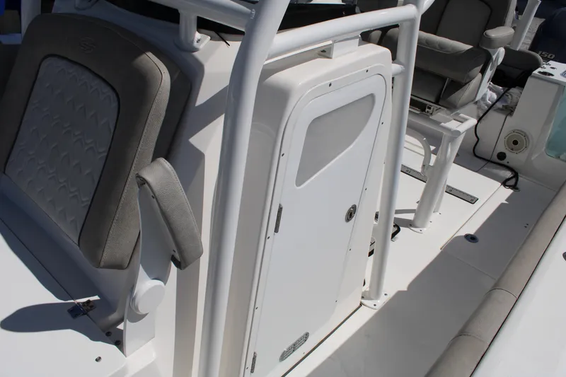 Slide: The Image of 2021 Sea Fox 268 Commander boat interior with seating and storage compartment. - 29