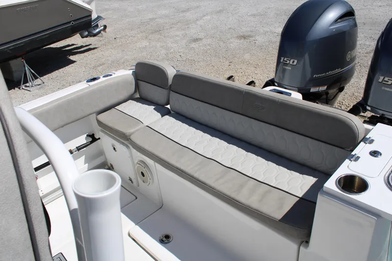 Slide: The Image of 2021 Sea Fox 268 Commander boat seating area with twin outboard engines. - 35