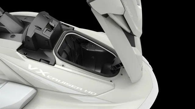 Slide: The Image of 2025 Yamaha Waverunner VX Cruiser HO with Audio, open storage compartment, sleek design. - 11