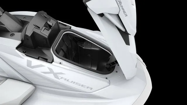 Slide: The Image of 2025 Yamaha Waverunner VX with open storage compartment, showcasing sleek design. - 13