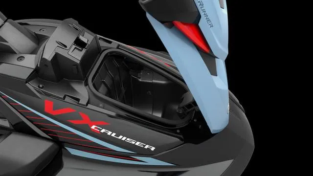 Slide: The Image of 2025 Yamaha Waverunner VX Cruiser with Audio, open storage compartment, sleek design. - 12
