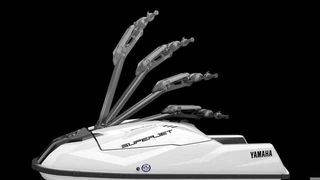 Slide: The Image of 2025 Yamaha Waverunner Superjet with robotic arms, sleek white design on black background. - 10