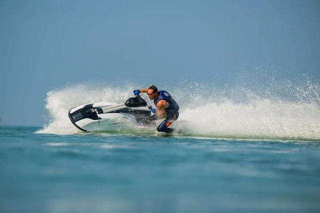 Slide: The Image of 2025 Yamaha Waverunner Superjet in action on open water, creating a dynamic splash. - 17