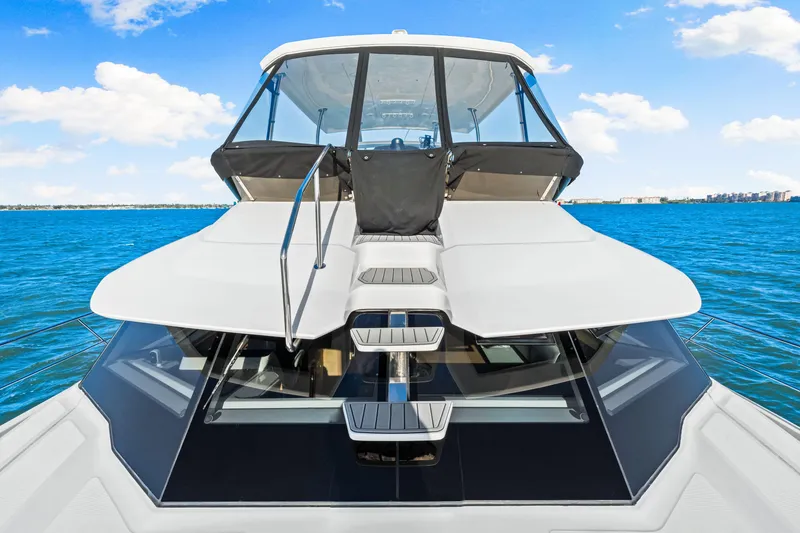 Slide: The Image of 2022 Aquila 44 Yacht on blue water, showcasing sleek design and modern features. - 23
