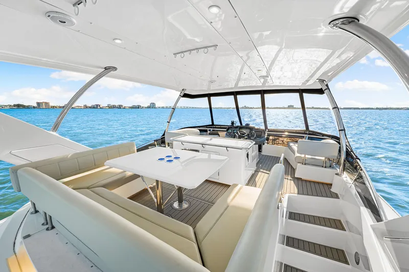 Slide: The Image of 2022 Aquila 44 Yacht interior with spacious seating and ocean view. - 24