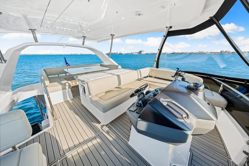 Slide: The Image of Aquila 44 Yacht 2022 interior with luxurious seating and ocean view. - 30