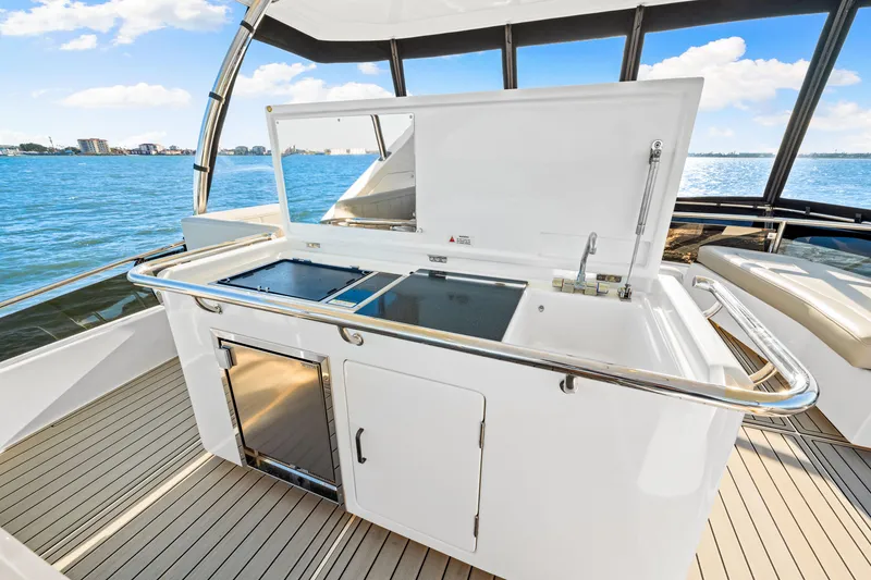 Slide: The Image of Luxury outdoor kitchen on 2022 Aquila 44 Yacht with ocean view. - 34