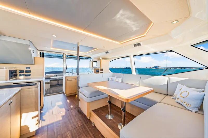 Slide: The Image of Luxurious interior of 2022 Aquila 44 Yacht with modern seating and ocean view. - 39
