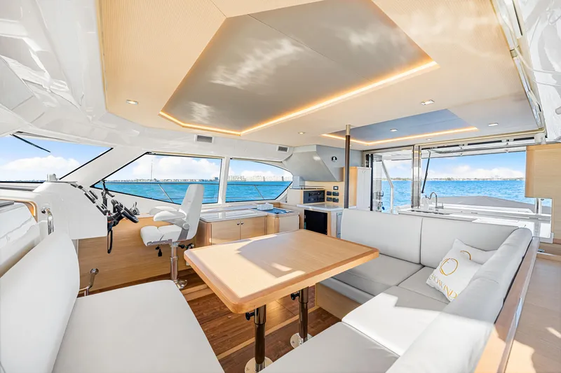 Slide: The Image of Luxurious interior of 2022 Aquila 44 Yacht with modern seating and ocean view. - 42