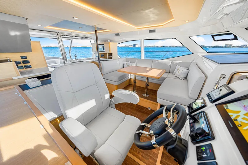 Slide: The Image of Luxurious interior of 2022 Aquila 44 Yacht with modern seating and ocean view. - 48