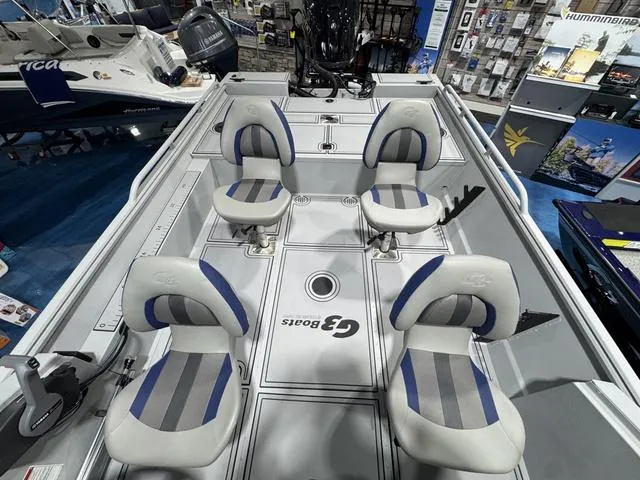 Slide: The Image of 2025 G3 Sportsman 2100 boat interior with four cushioned seats and sleek design. - 7