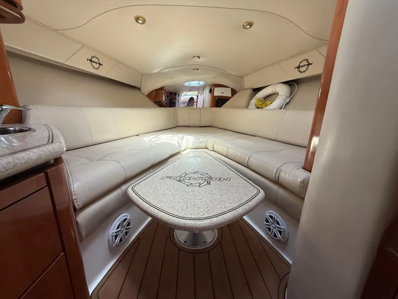 Slide: The Image of Luxurious interior of 2010 Fountain 38 LX boat with plush seating and elegant design. - 33