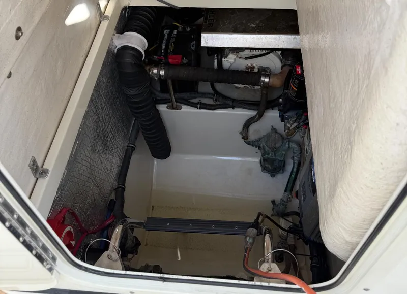 Slide: The Image of Engine compartment of a 2005 Hydra-Sports Vector 3300 VX boat. - 11