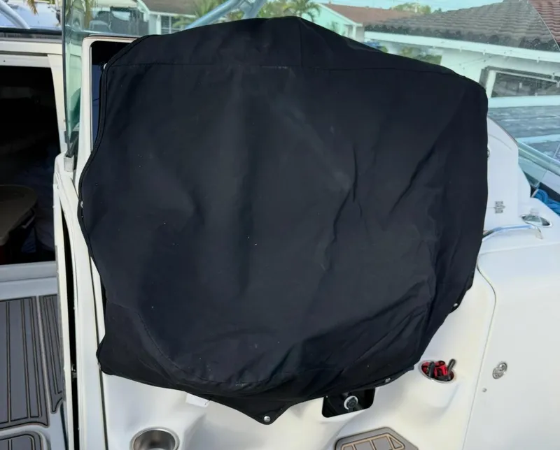 Slide: The Image of 2005 Hydra-Sports Vector 3300 VX helm covered with a black protective cover. - 20