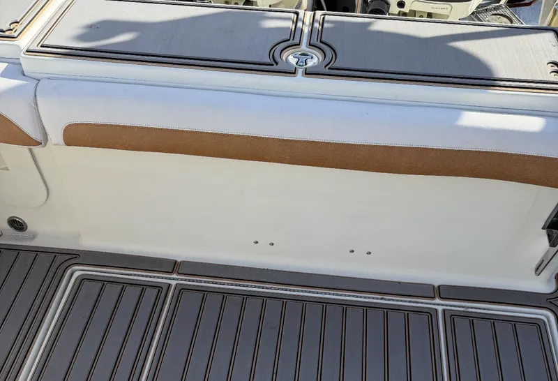 Slide: The Image of 2005 Hydra-Sports Vector 3300 VX boat deck with cushioned seating and non-slip flooring. - 5