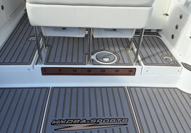 Slide: The Image of 2005 Hydra-Sports Vector 3300 VX boat deck with ruler and logo detailing. - 9