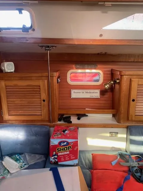 Slide: The Image of Interior of 1996 Catalina 36 MK 2 sailboat with wooden cabinets and nautical decor. - 10