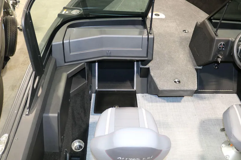 Slide: The Image of 2025 Alumacraft Competitor 175X Sport Rotax S interior with seating and storage compartments. - 12