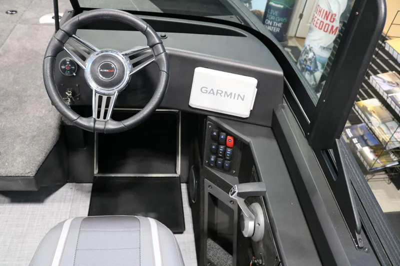 Slide: The Image of 2025 Alumacraft Competitor 175X Sport Rotax S dashboard with Garmin navigation system. - 14