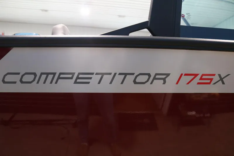 Slide: The Image of 2025 Alumacraft Competitor 175X Sport Rotax S boat logo on side panel. - 22