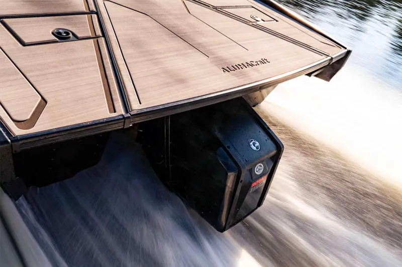 Slide: The Image of 2025 Alumacraft Competitor 175X Sport Rotax S boat on water, showcasing sleek design. - 41