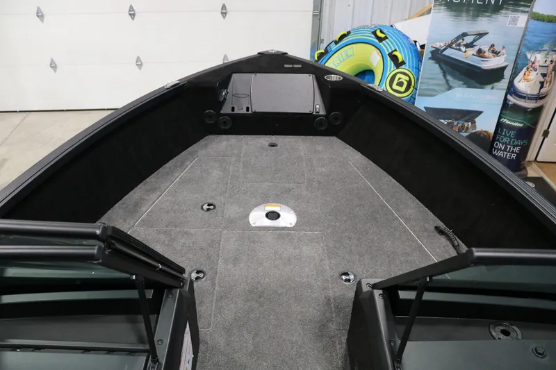 Slide: The Image of 2025 Alumacraft Competitor 175X Sport Rotax S boat interior with spacious deck and storage. - 7