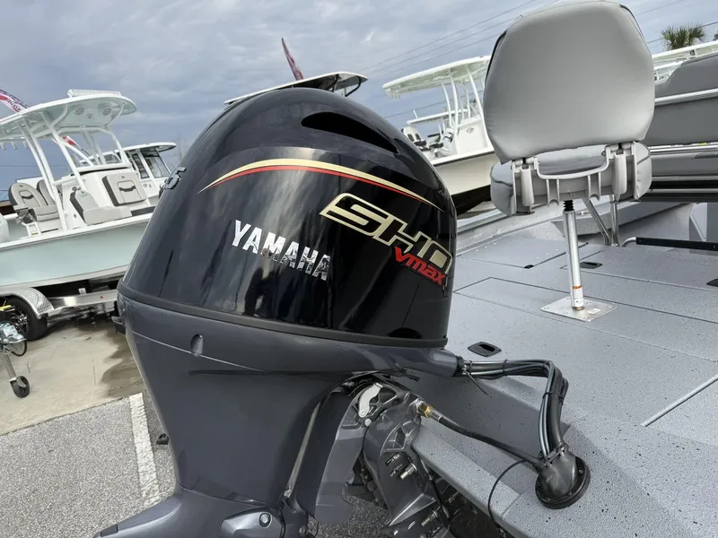 Slide: The Image of 2025 Xpress Hyper-Lift H20B boat with Yamaha SHO VMAX engine, docked outdoors. - 5