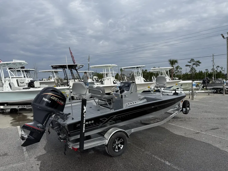 Slide: The Image of 2025 Xpress Hyper-Lift Series H20B boat with new console on trailer. - 6
