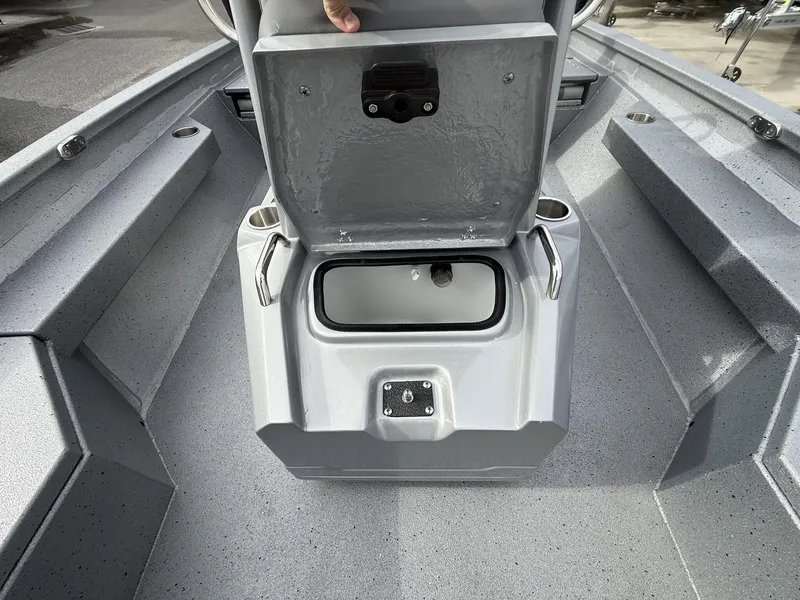 Slide: The Image of 2025 Xpress Hyper-Lift Series H20B boat console with open storage compartment. - 7