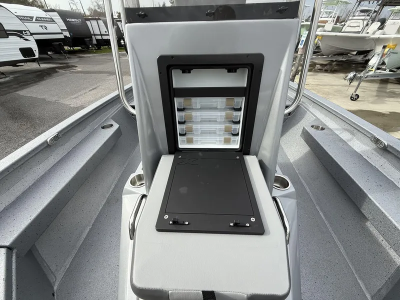 Slide: The Image of 2025 Xpress Hyper-Lift Series H20B boat console with storage compartments. - 8