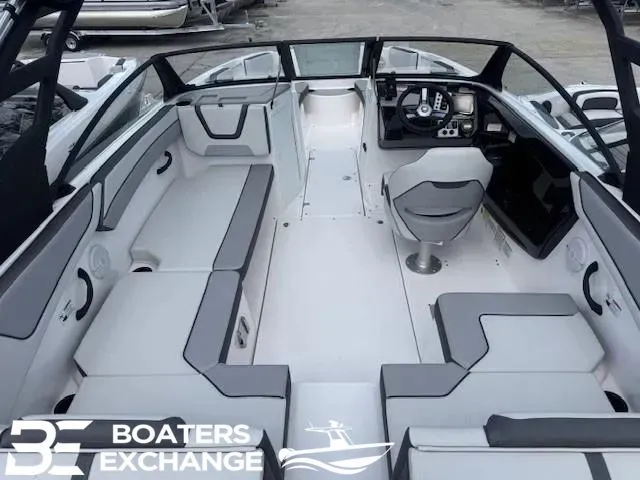 Slide: The Image of Interior of 2025 Yamaha AR220 boat with modern seating and helm. - 3