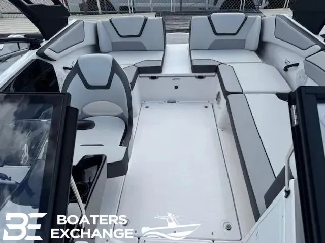 Slide: The Image of Interior of 2025 Yamaha AR220 boat with modern seating. - 4