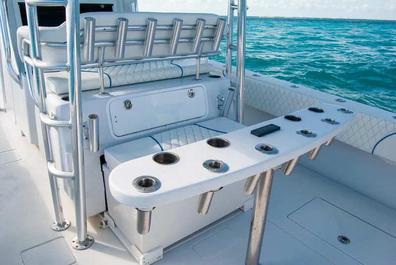 Slide: The Image of 2019 Contender 39 ST boat interior with rod holders, ocean view. - 10