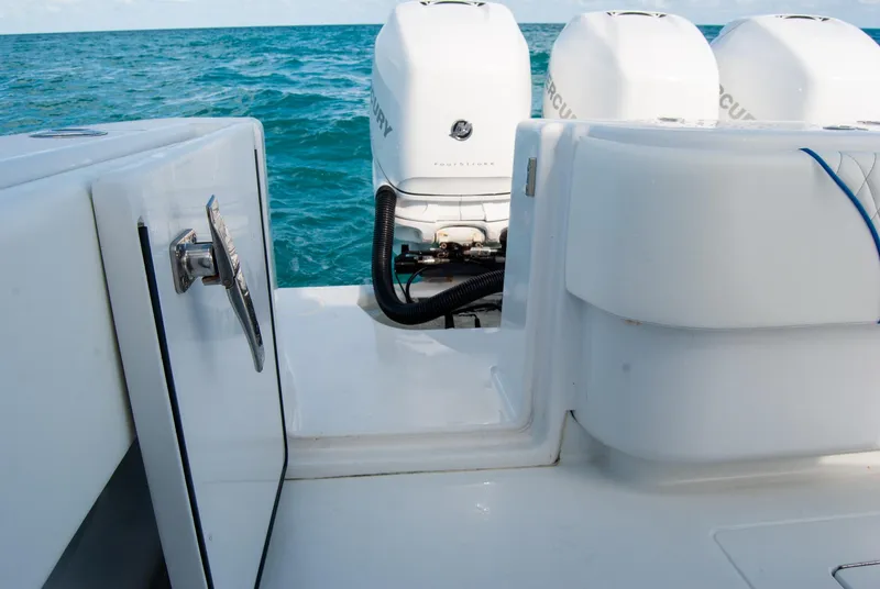 Slide: The Image of 2019 Contender 39 ST boat with Mercury outboard engines on open sea. - 12