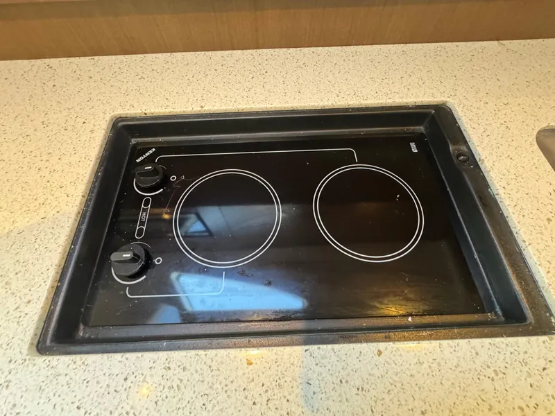 Slide: The Image of Built-in electric stove on Sea Ray 370 Sundancer yacht, 2016 model. - 31