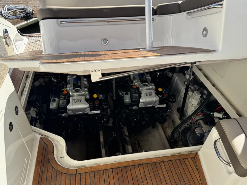 Slide: The Image of Engine compartment of 2016 Sea Ray 370 Sundancer with twin V8 engines. - 33