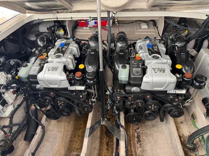 Slide: The Image of Twin V8 engines in a 2016 Sea Ray 370 Sundancer boat engine compartment. - 35