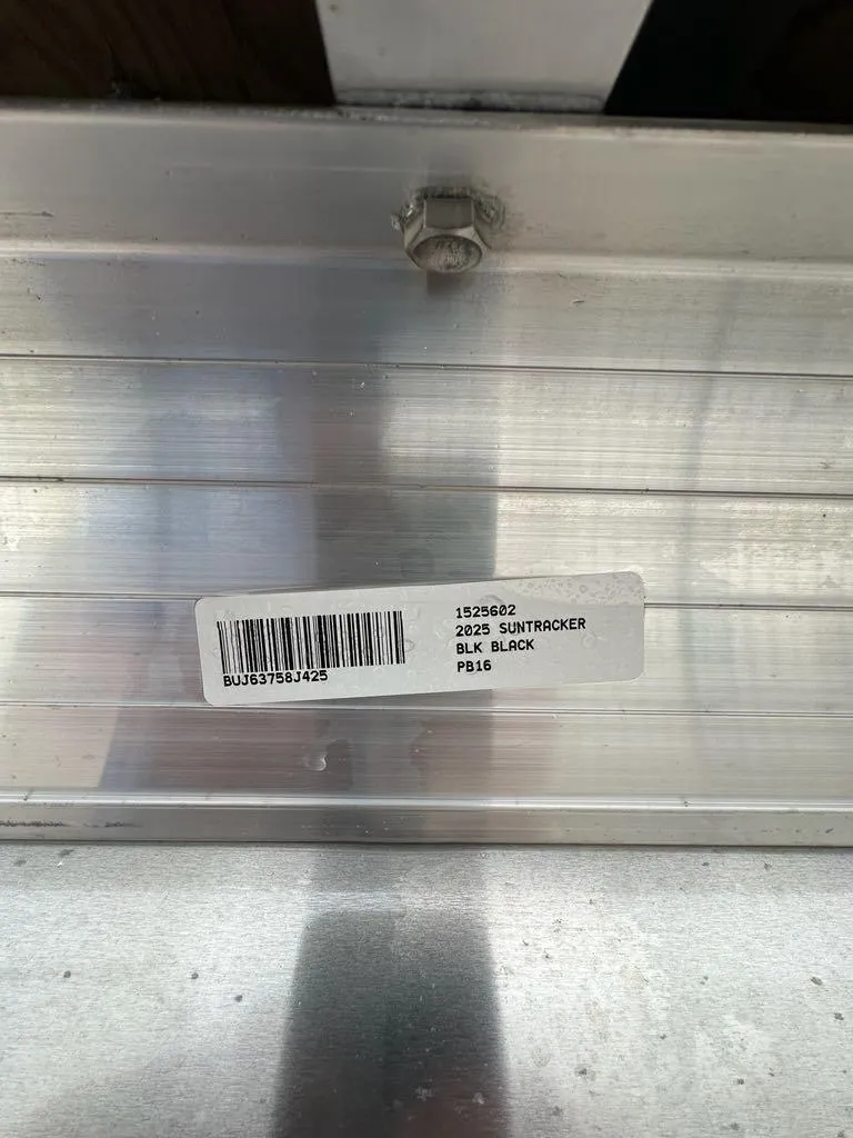 Slide: The Image of Label on 2025 Sun Tracker Party Barge 16 DLX with barcode and product details. - 7