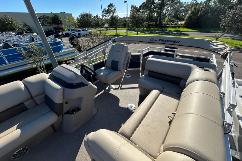 Slide: The Image of 2025 Sun Tracker Fishin' Barge 20 DLX pontoon boat with spacious seating and modern design. - 3
