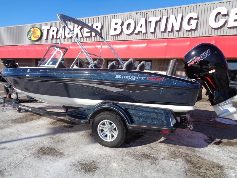 Slide: The Image of 2024 Ranger 1850MS boat at Tracker Boating Center, featuring sleek design and powerful engine. - 2