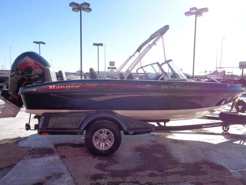 Slide: The Image of 2024 Ranger 1850MS boat on trailer, side view in outdoor setting. - 4