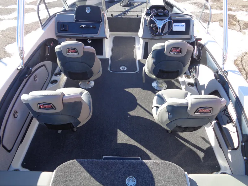 Slide: The Image of 2024 Ranger 1850MS boat interior with four seats and modern dashboard. - 8