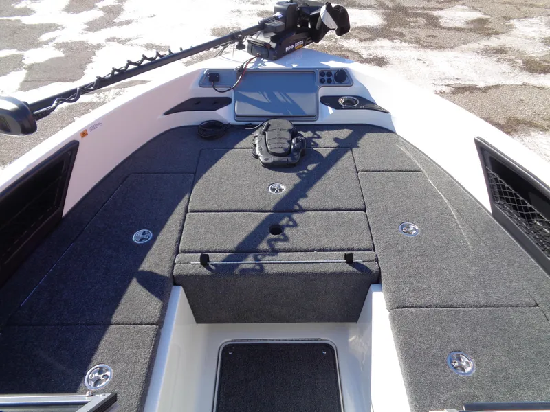 Slide: The Image of 2024 Ranger 1850MS boat deck with advanced navigation system and storage compartments. - 9
