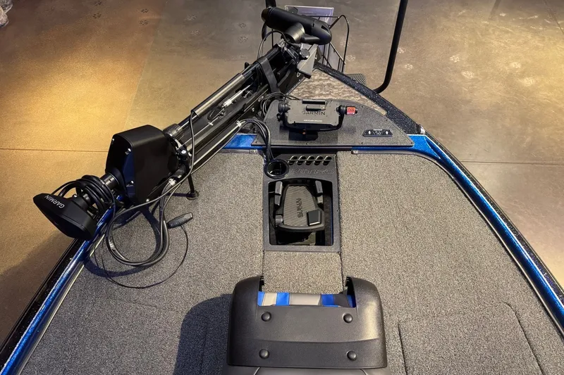 Slide: The Image of 2025 Nitro Z20 XL Pro boat deck with Garmin trolling motor and pedal controls. - 9