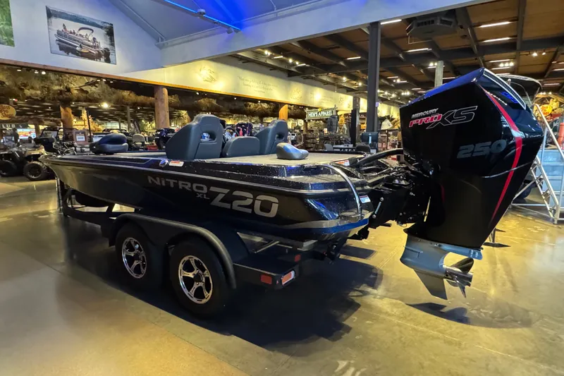 Slide: The Image of 2025 Nitro Z20 XL Pro boat with Mercury Pro XS 250 engine in showroom. - 4